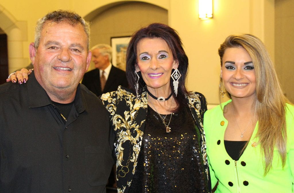 Officer Alfred Mansuetti with his wife, Cheryl (Mancini) Mansuetti, and daughter, Kimba Mansuetti, a dispatcher in the PC Office of Safety and Security, at PC's Service Awards Dinner in 2019.