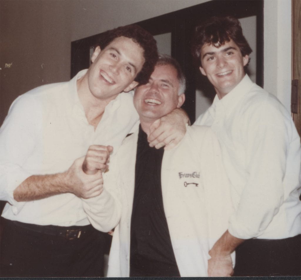 Known for his wit and humor, Rev. J. Stuart McPhail, O.P. ’61 clowns around with Friars Club members James J. Rushin ’83, left, and Michael P. Lynch ’83.