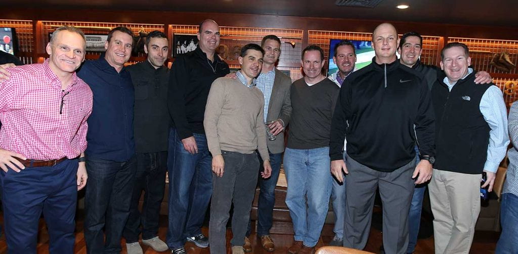 Former players gather at the 25th anniversary reunion of the Providence College BIG EAST championship baseball team in January 2017.
