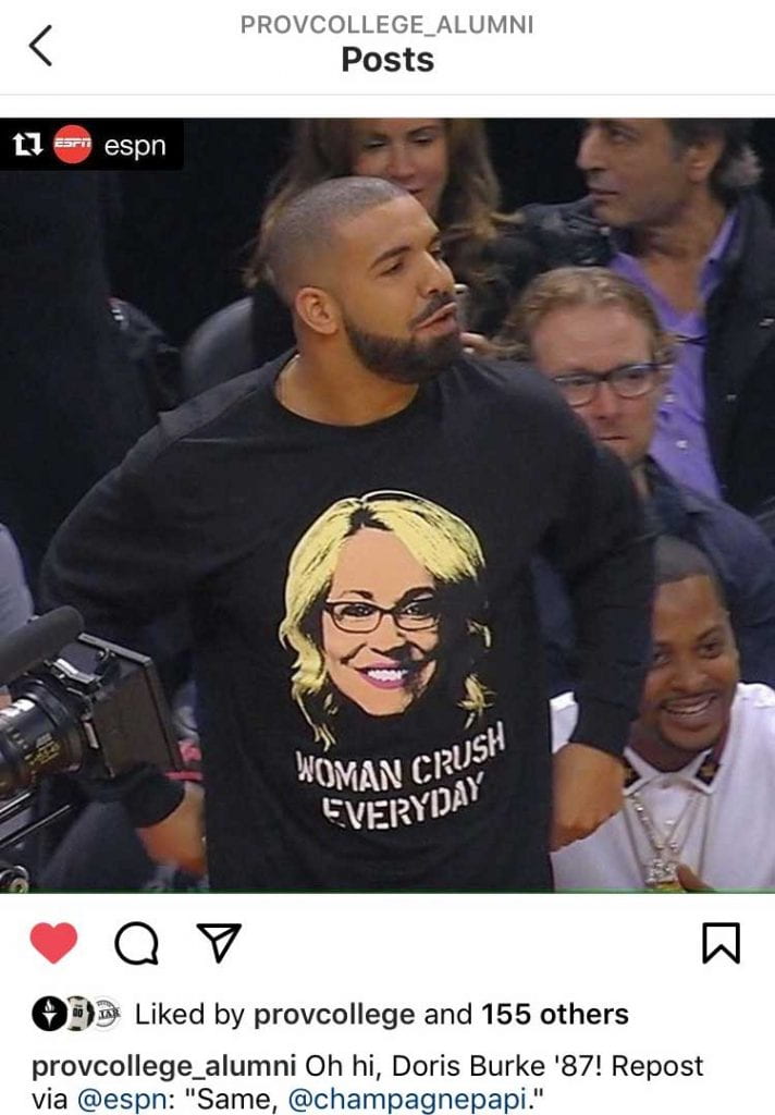 Rapper Drake wearing his "Woman Crush Everyday" shirt featuring a picture of ESPN analyst Doris Burke.