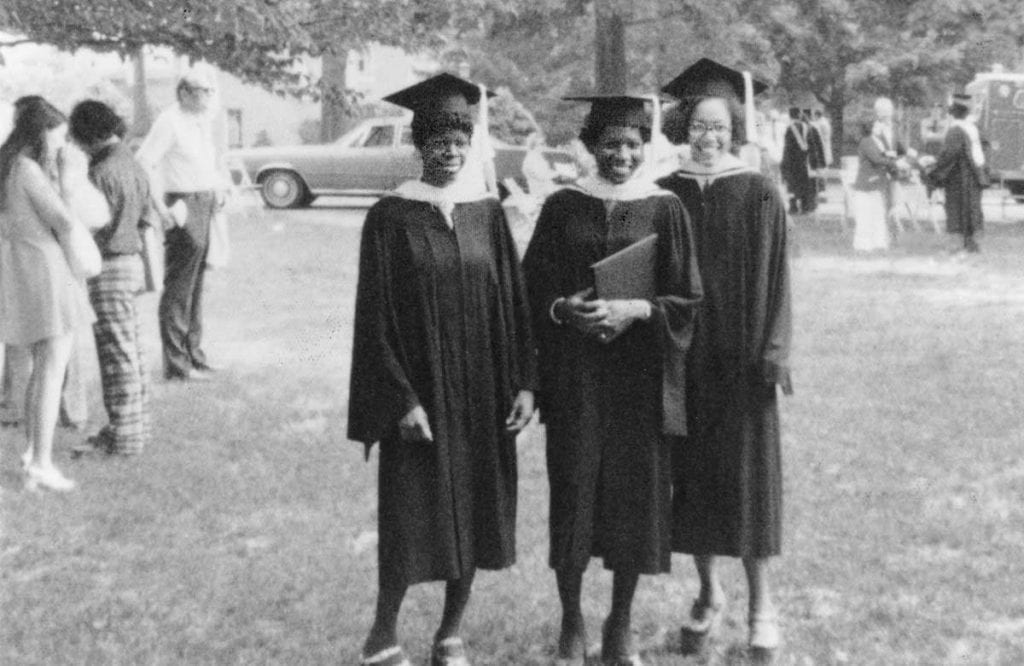 At commencement in 1975, from left: Brenda Chapman McGill ’75, Wanda Johnson Ingram ’75, and Eva (Weston) Irby-Davis ’75.