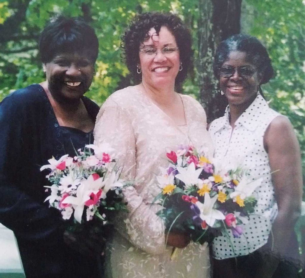The three classmates reunite at the 2007 wedding of Eva (Weston) Irby-Davis ‘75, center. At left is Dr. Wanda Johnson Ingram ‘75, dean of undergraduate and graduate studies at PC, and at right, Brenda Chapman McGill ‘75.