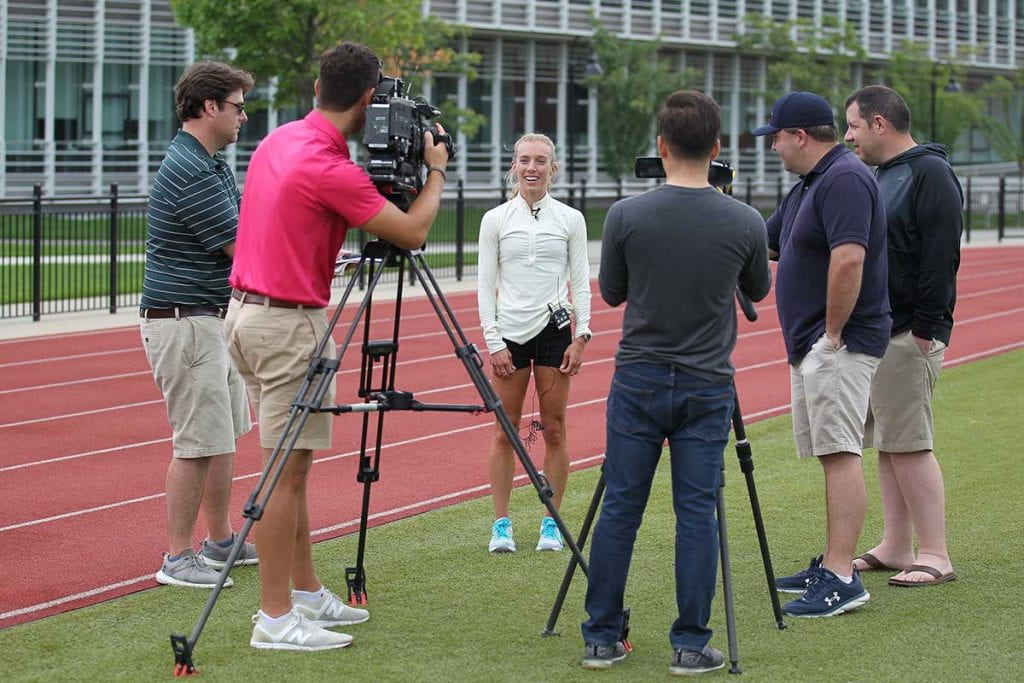 Emily Sisson '15 meets the press after a workout at Providence College on Saturday, July 10.