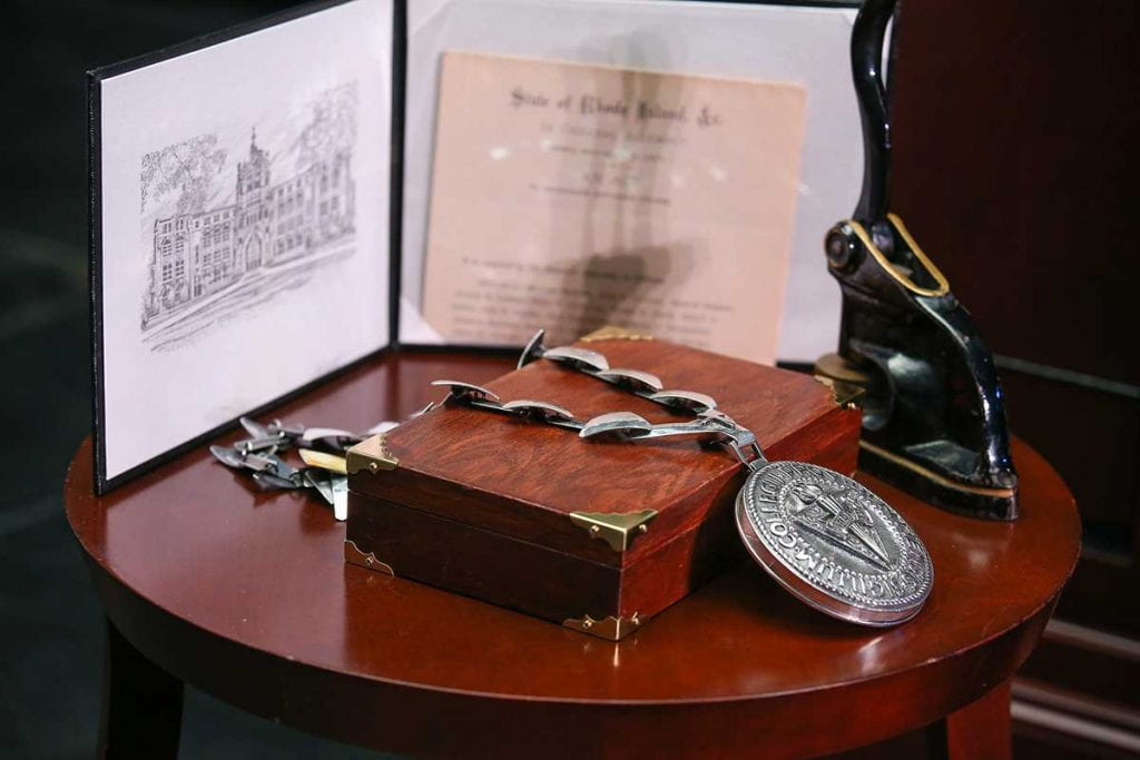 The symbols of office for the president: the College Charter, the Great Seal, and the Medallion.