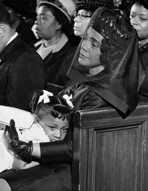 Coretta Scott King comforts her 5-year-old daughter, Bernice, at the funeral of Rev. Dr. Martin Luther King, Jr. This photograph won the 1968 Pulitzer Prize for Feature Photography.