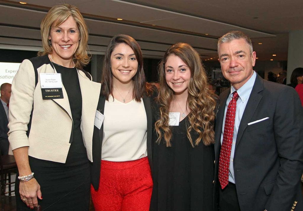 Trustee Susan Esper '91 with her daughters, Victoria Esper '19 and Olivia Esper '22, and husband, Jeffrey.