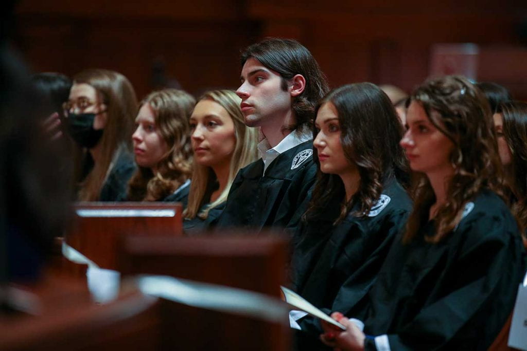 Students listen as they are inducted into the new chapter of Phi Beta Kappa, called Gamma of Rhode Island.