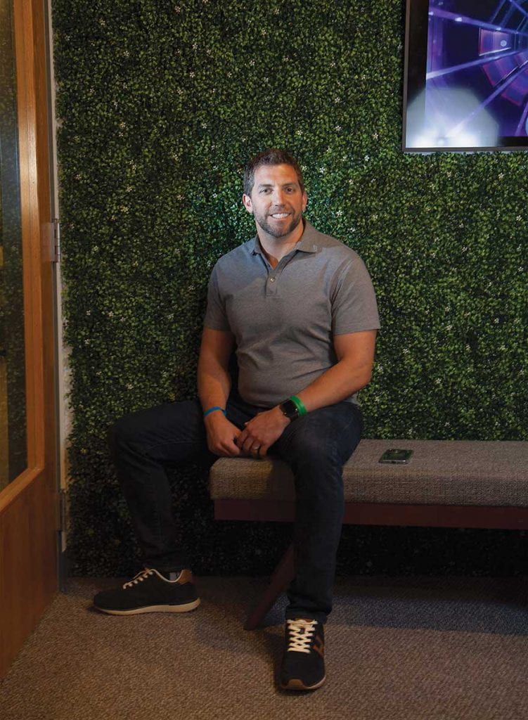 Eddie Martucci, Ph.D. '04 in Akili Interactive's offices in Boston. Research in his junior and senior years at Providence College helped him discover his vocation as a scientific innovator.