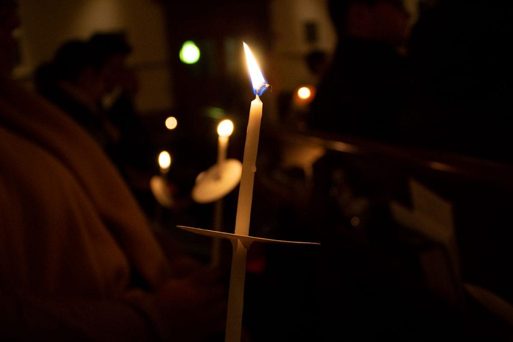 The candlelight vigil in St. Dominic Chapel (Photo by Cristopher Alvarez '22)