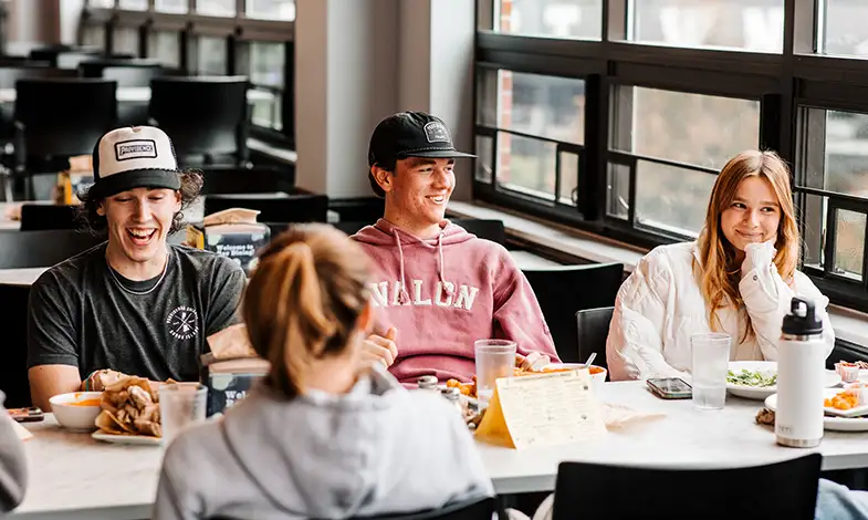 students eating in ray cafeteria