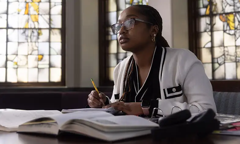 student studying in ruane