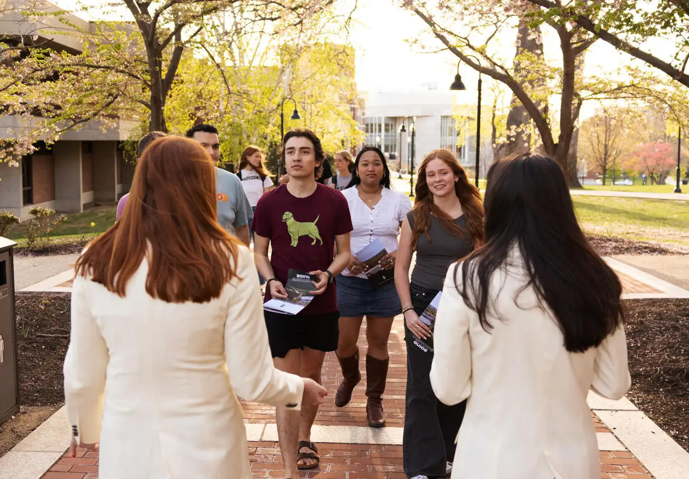 tour guides walking on campus