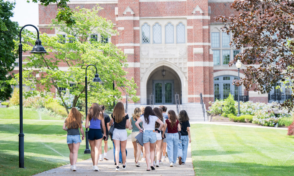 tour guests walking on campus