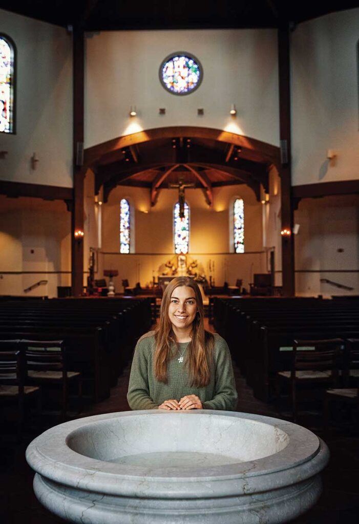 Lydia Watson '22 poses in St. Dominic Chapel.