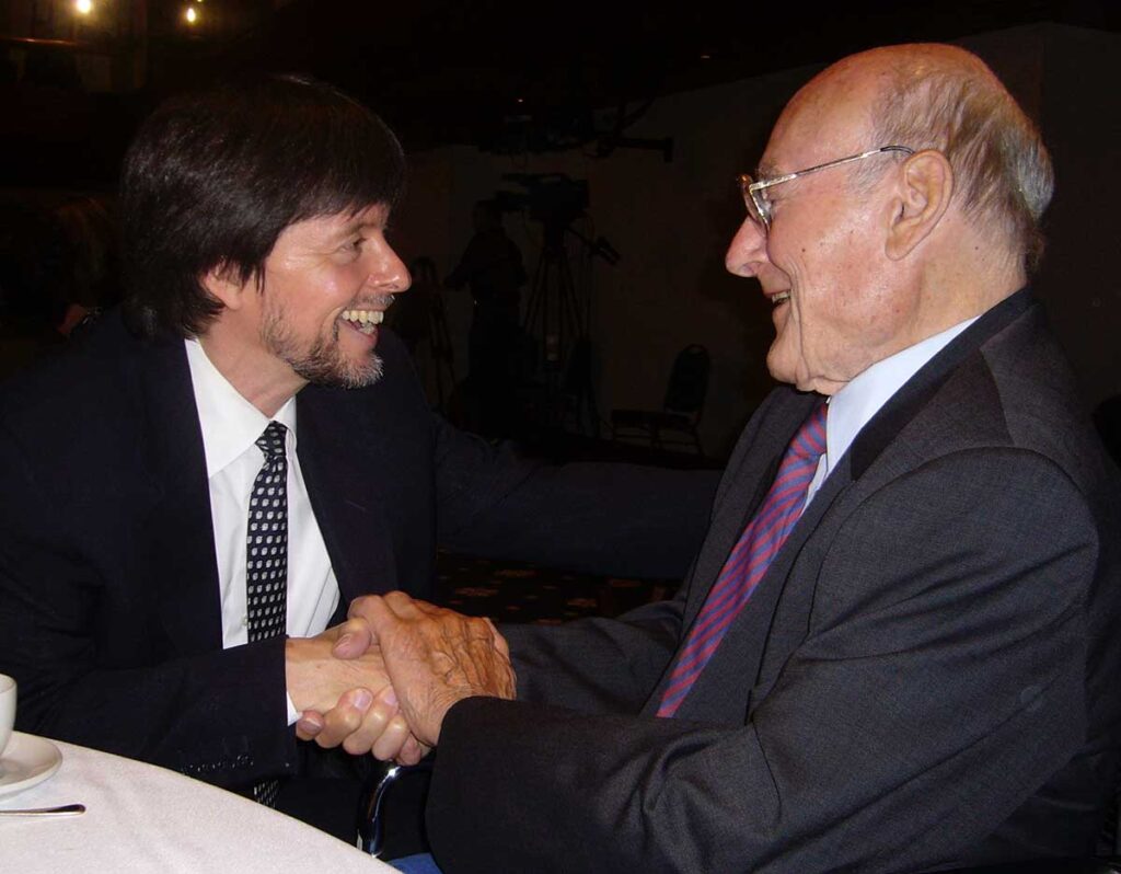 Navy Lt. Cmdr. Joseph P. Vaghi Jr. '42 with Ken Burns, creator of the documentary that featured his story.