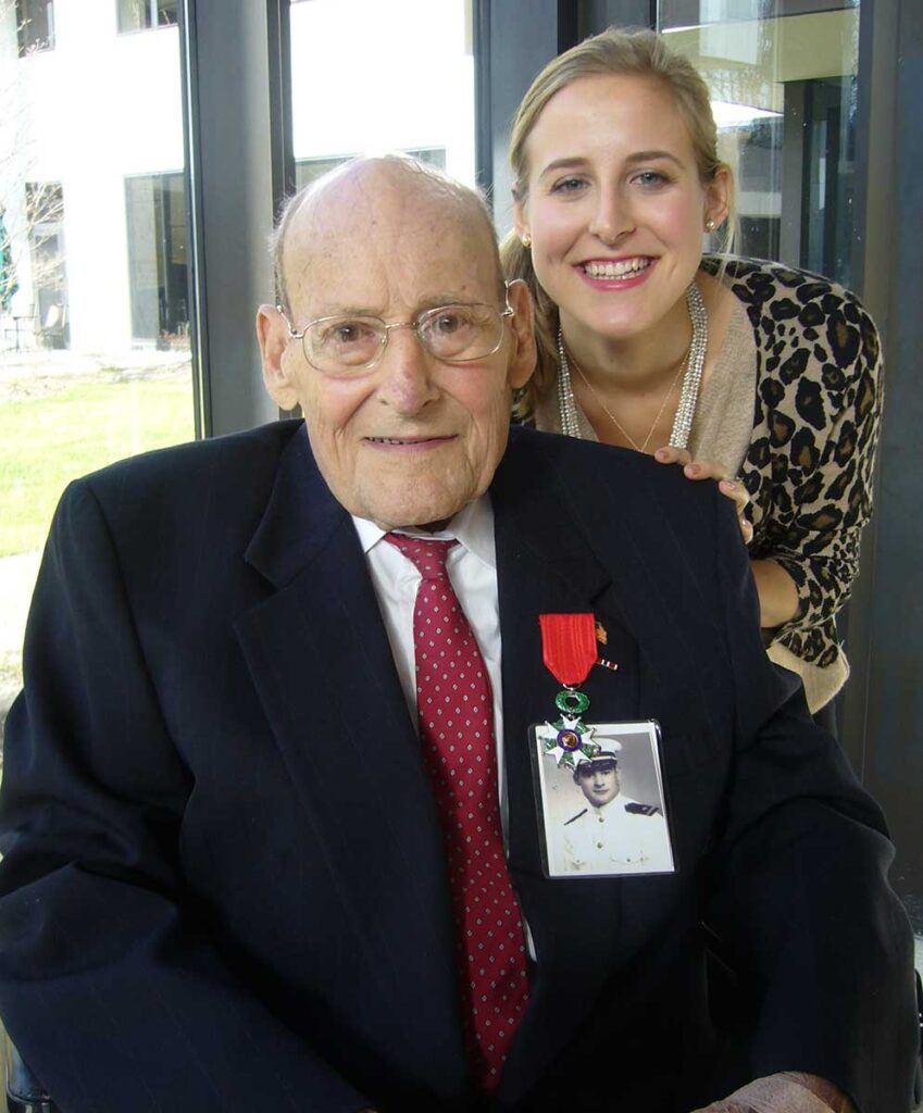 In 2012, Navy Lt. Cmdr. Joseph P. Vaghi Jr. '42 received the Legion of Honor, France's highest civilian honor, at the French Embassy in Washington, D.C. He is pictured with his granddaughter, Elizabeth Vaghi '10. Lt. Cmdr. Vaghi died six months after the ceremony.