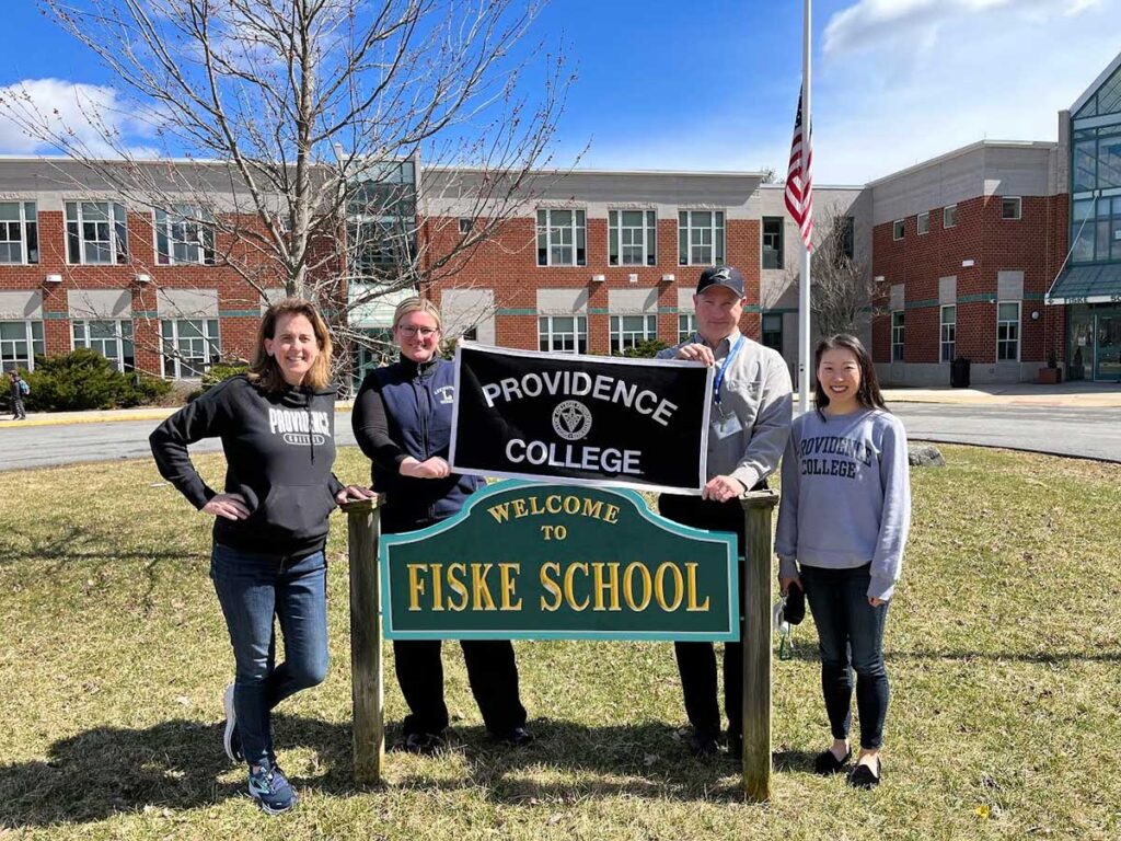 Any school day can mean a Friar reunion at Fiske Elementary School in Lexington, Mass., where four alumni are on the staff. From left, Catherine (Glennon) Murphy ’89, an English Language Learner teacher; Karlee (Binnig) Dana ’07, school nurse for all K-5 students; Harold “Sonny” Wilde ’96, a fourth grade teacher; and Francine (Chi) Hannan ’10, a multisensory reading teacher.