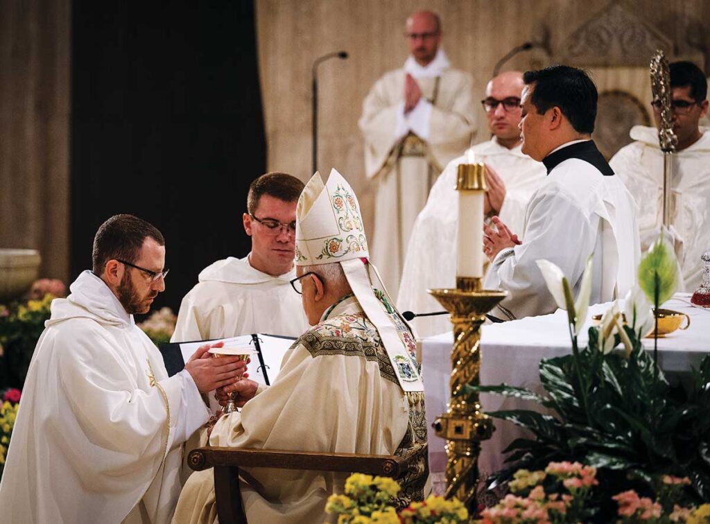 During the ordination, Archbishop J. Augustine Di Noia '65 handed the paten and chalice to Rev. James Mary Ritch, O.P. '08, saying, "Receive the oblation of the holy people to be offered to God. Understand what you will do, imitate what you will celebrate, and conform your life to the mystery of the Lord's cross."