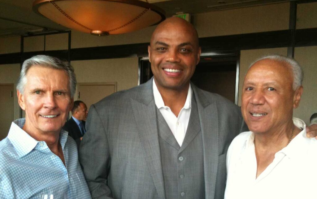 Johnny Egan '61, far left, with Charles Barkley, center, and Lenny Wilkens '60, '80Hon. in 2013.