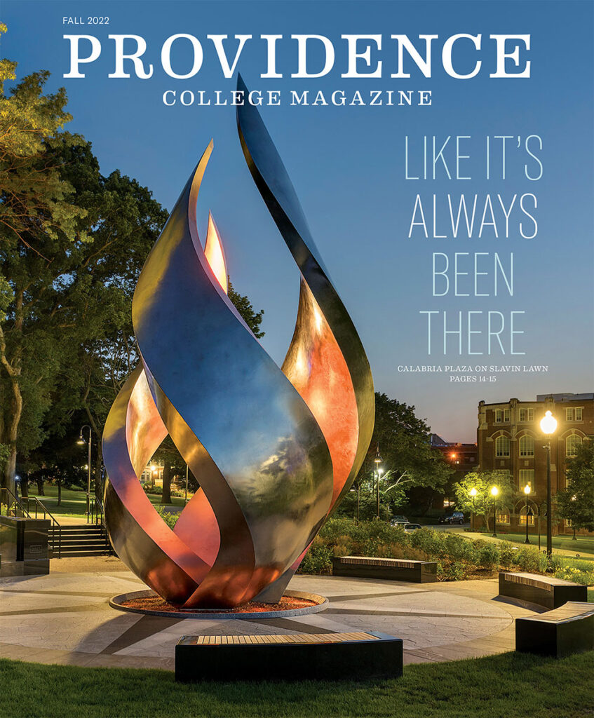 Fall 2022 cover Providence College Magazine featuring Calabria Plaza with flame