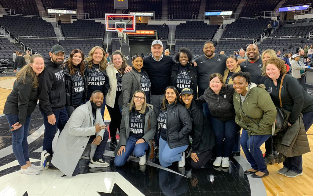 Counselors from 13 Cristo Rey high schools joined the Office of Admission for the men's basketball game at Amica Mutual Pavilion in downtown Providence.