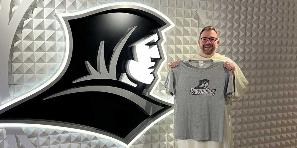 Father Jordan with Friar Fanatics T-shirt