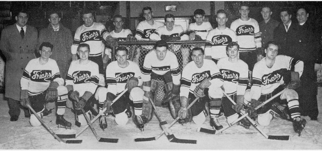 A photo of the men's hockey team from the 1952 Veritas yearbook.
