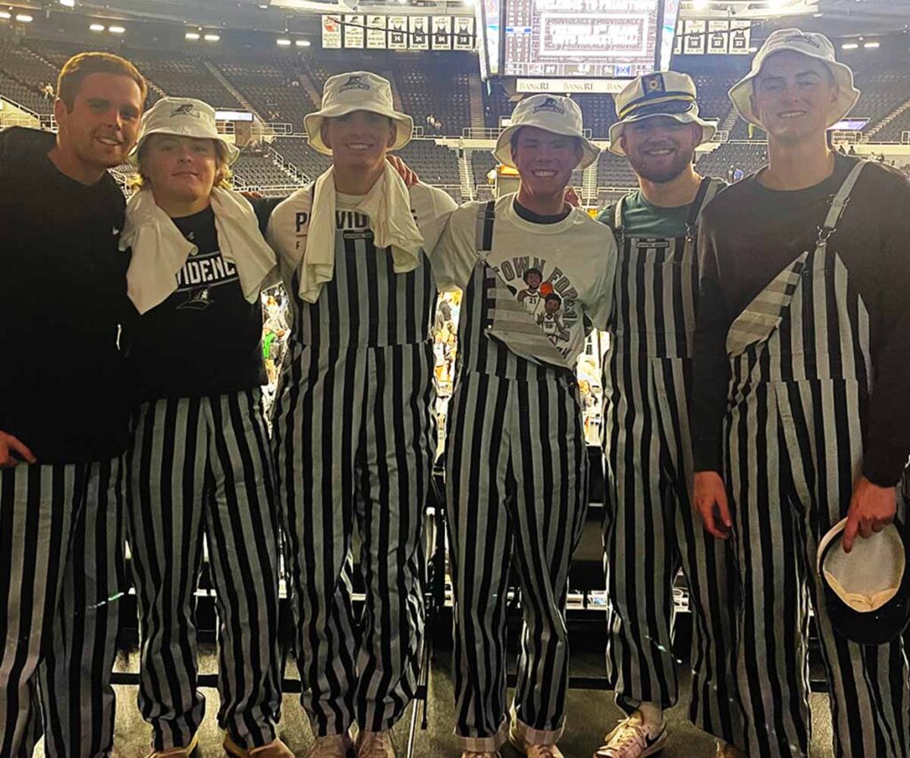 Fodero and his friends in black and white overalls at the Amica Mutual Pavilion