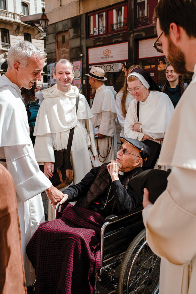 A 96-year-old Carmelite friar in Palencia, Spain, converses with Rev. Dominic Verner, O.P. From left are Rev. Justin Bolger, O.P., Sister Anne Frances Klein, O.P., and Rev. Irenaeus Dunlevy, O.P.