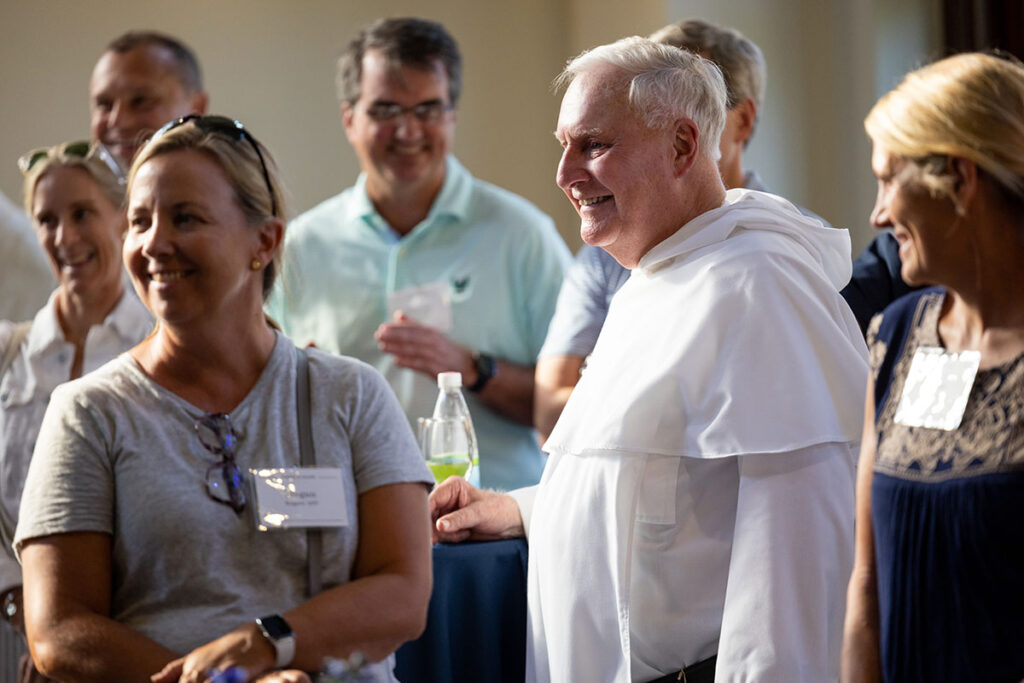 Rev. James F. Quigley, O.P. '60, at a reception welcoming parents of students in August 2022.