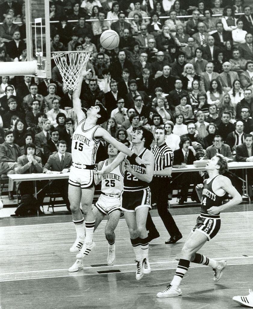 Ernie DiGregorio, number 15, playing for the Providence College Friars.