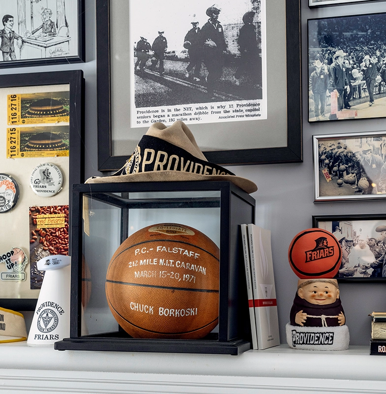 Memorabilia from the bar -- cartoons, a basketball, press clippings.