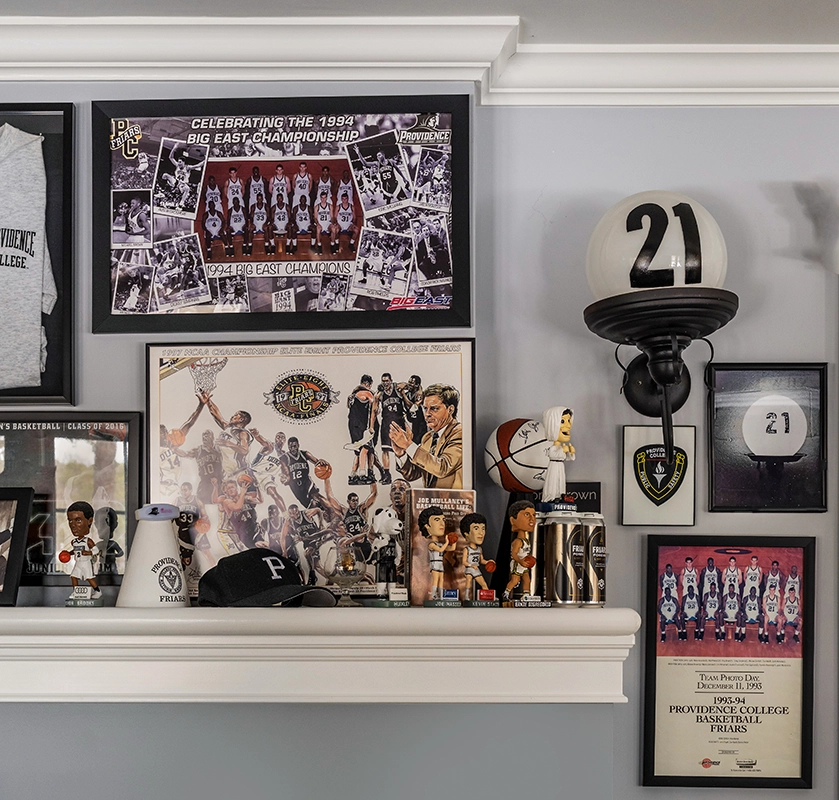 Memorabilia from the collection of Chuck Borkoski, including bobbleheads, illustrations, and photographs.