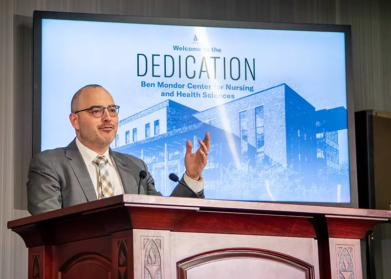 Paul Coyne, DNP '08, keynote speaker at the Mondor Center dedication.