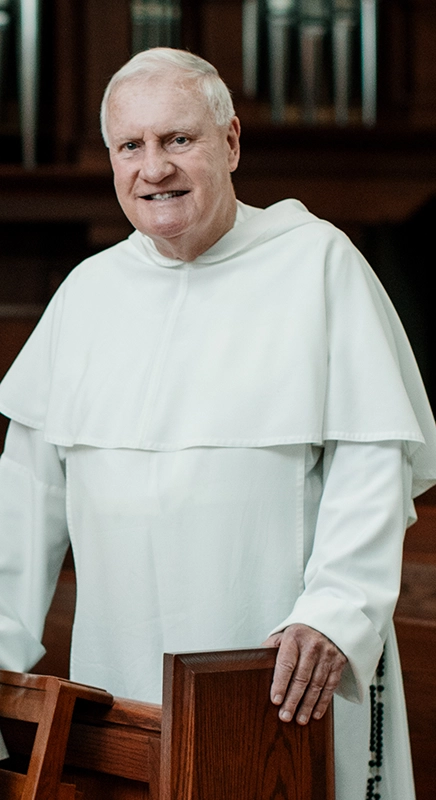 Rev. James Quigley, O.P. '60 in St. Dominic Chapel