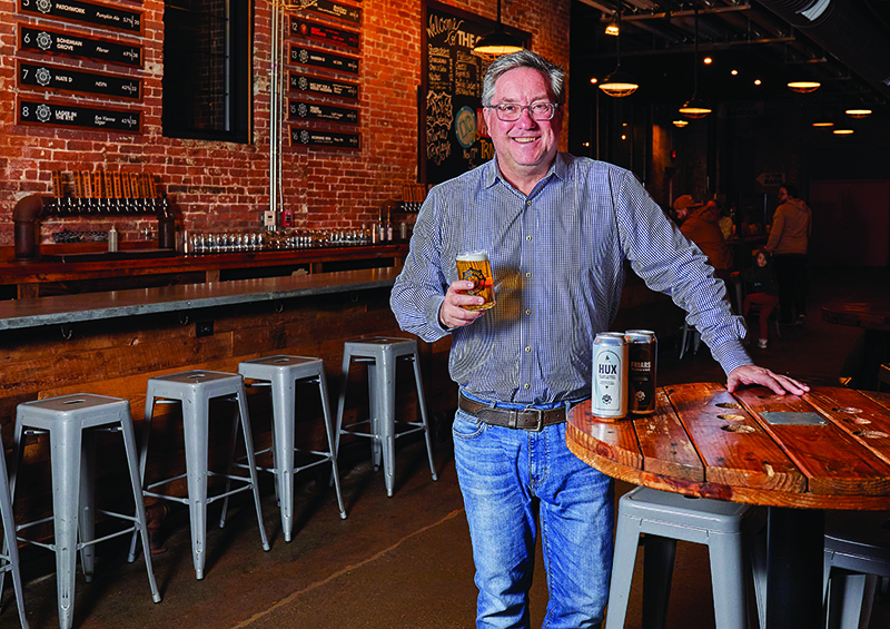 Jeremy Duffy '93 in The Guild, his 18-tap beer hall in Pawtucket, Rhode Island.