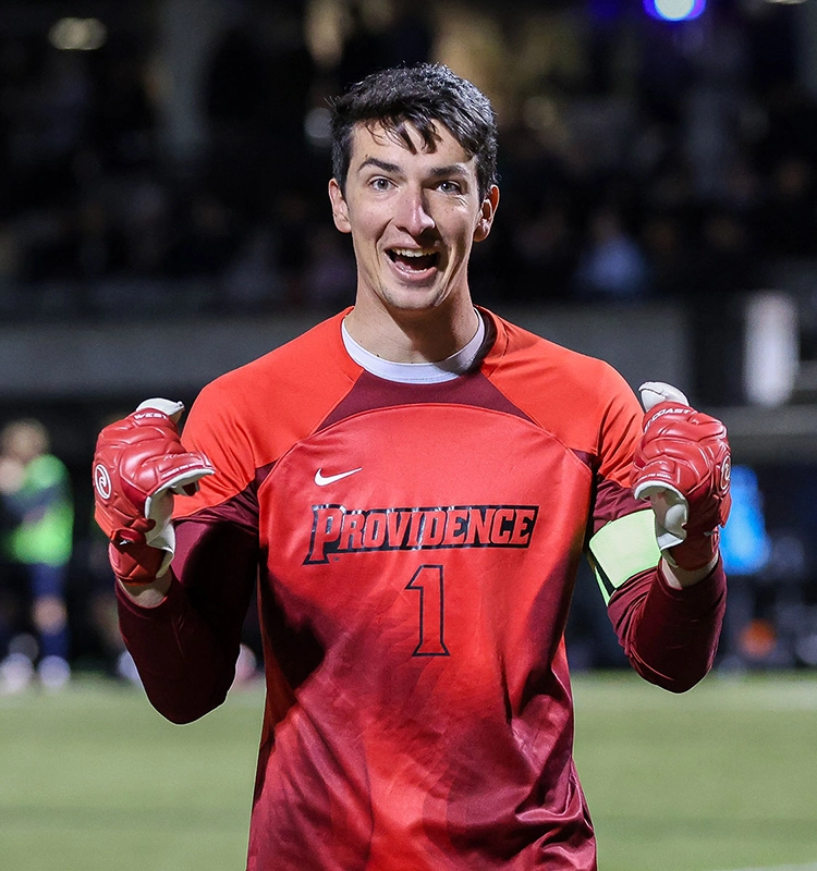 Lukas Burns '24, BIG EAST preseason goalie of the year, celebrates after a victory.