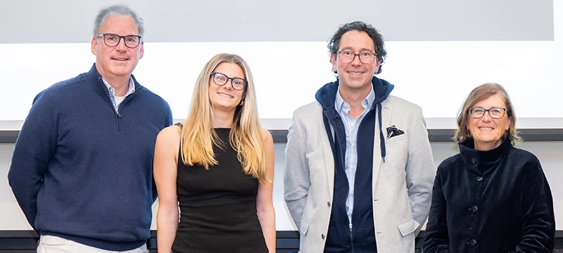 Neve Palmeri '27 at the Ryan Incubator Elevator Pitch Competition with, from left, John Dawley '86, a consultant for technology startup companies; Dan Murphy, a member of the Ryan Incubator Advisory Board; and Sylvia Maxfield, Ph.D., interim provost and senior vice president for academic affairs.