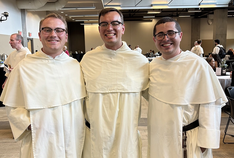 Rev. Nicodemus Thomas, O.P. '18 with his classmates at PC and at the Dominican House of Studies — Brother Jeremian Tobin, O.P. '20, left, and Brother Raphael Arteaga, O.P. '19.