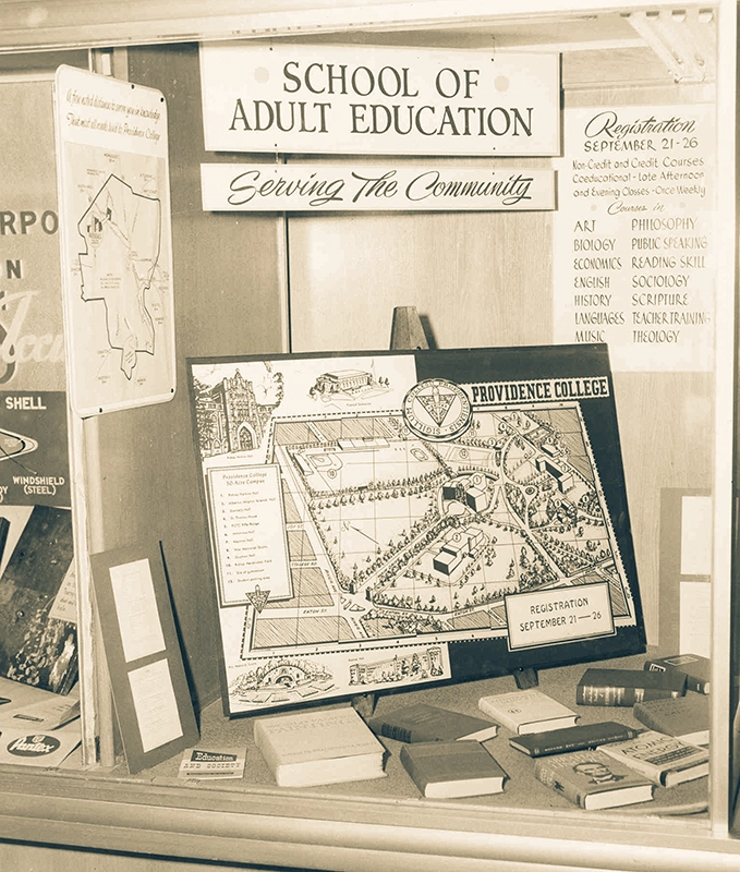 A display from 1953 showing registration material and a campus map for the "School of Adult Education."