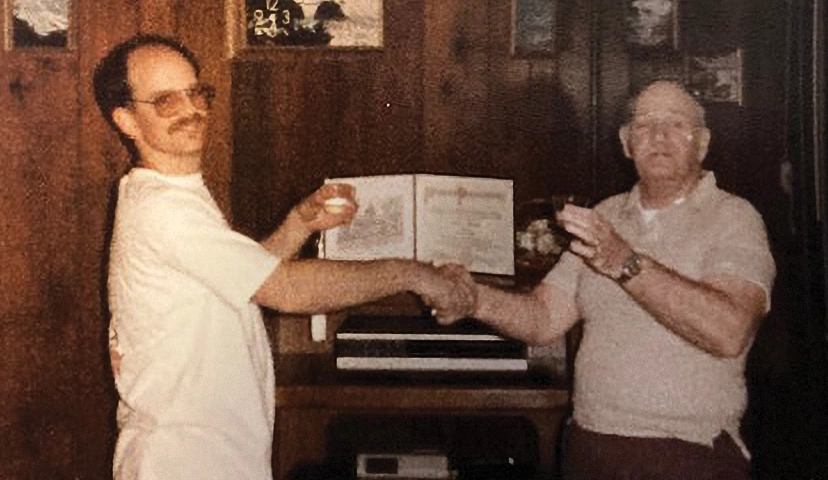 Steve Richards with his bachelor's degree and his father, Raymond Richards '52, in 1989.