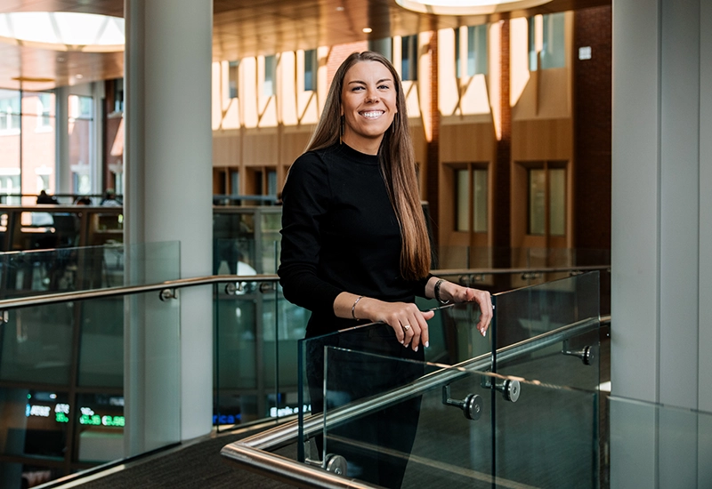 Abigail Corrington, Ph.D., assistant professor of management, inside the School of Business.