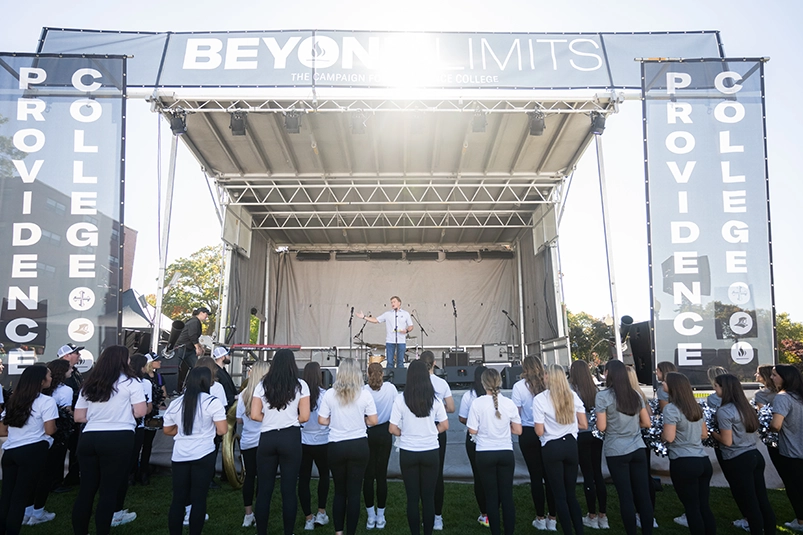 John McCarthy '86, a chair of the steering committee for the Beyond Limits campaign, during the celebration at Homecoming on Slavin lawn.