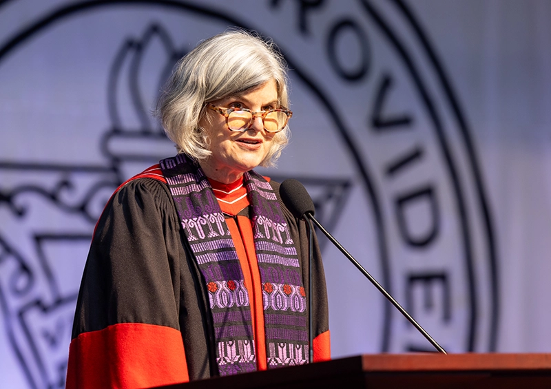 Licia Carlson, Ph.D., professor of philosophy and recipient of the Outstanding Faculty Scholar Award, speaks at Academic Convocation.