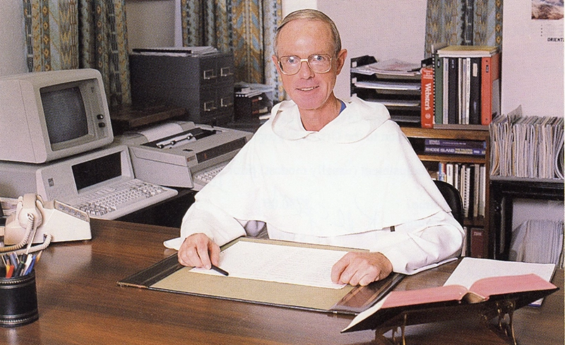 Rev. Terence Keegan, O.P. '60 at his desk in 1991.