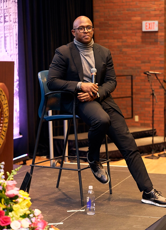 Matthew Slater, former New England Patriot, answers questions during the MLK Celebration in Slavin Center '64 Hall.