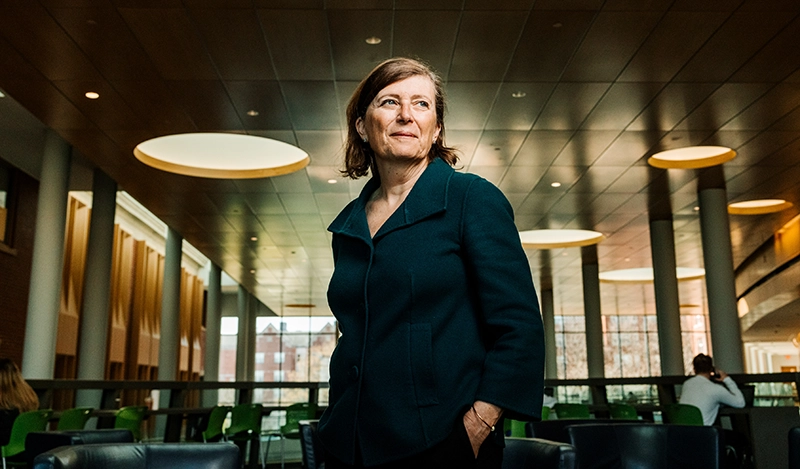 Sylvia Maxfield, Ph.D., in the Palmisano Atrium of the Ryan Center for Business Studies.