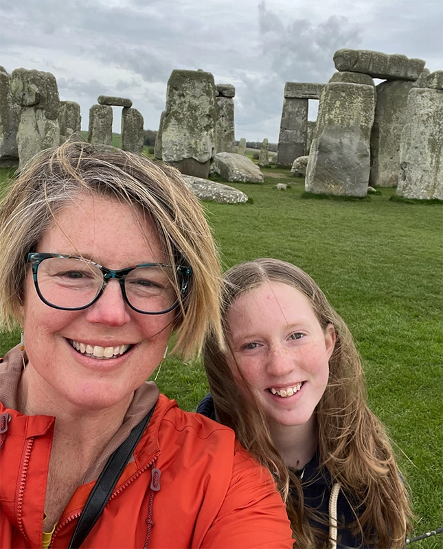 Jessica Mulligan, Ph.D., at Stonehenge with her daughter, Norah.