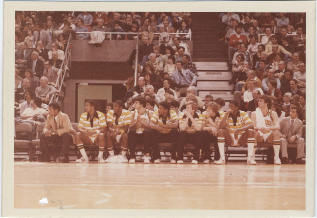 Fans cheering at Men's Basketball game 1980
