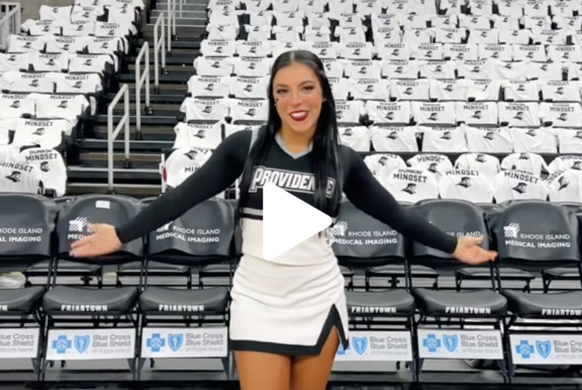 Cheerleading student section video play button